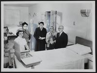 Memorial Hospital at Winchester (L to R) Mrs. Robert Taylor; Mrs. C. E. Olds; Mrs. Ed Walker; Mrs. Edith Braden; W. W. Mitchell.