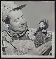 Centennial - Wilbur Criss, Eudora with doll made of hair from his beard.