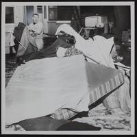 Fires - Homer Altenbernd rescuing items from his burning home.