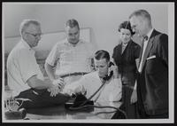 Dial Phones (L to R) City Manger Jim Wigglesworth; E. R. Cook, chamber of commerce; Mayor John Crown; Mildred Angel, Chief Op.; Owen Smith, local manager for Southwestern Bell.