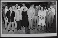 Lawrence shops - Bill Bodin, Inc. (Lincoln Mercury Auto Dealer) Front row (L to R) Marvin Clark; George Peppercorn; Marjorie Petersen; Bill Bodin; Arthur Johnson; Lauren McClure; Charlie Zook. (Back row) Bob Nitsch; D. E. Sassaman; Allen Hawley; Dick Bryan; Carroll Runyan; Bert Kapelle; Walter Donahue; Howard Graham. (AD)