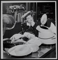 Women&#39;s styles - Mrs. Keith Young - choosing a hat.