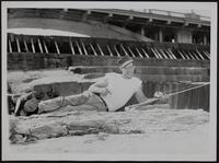 KS River - Fisherman Marvin Selichnow takes advantage of low water below dam.