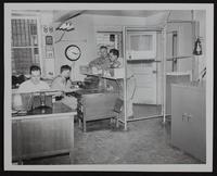 Douglas county jail office - Sheriff Bill Hodson at typewriter and Deputy Rex Johnson.