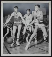 Haskell Basketball (L to R) Wamego&#39;s Tom McKowen (54); Haskell Cecil Jefferson (33) and Lee Edwards (30)