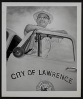Lawrence Officers A. T. (Buck) Hodges, street superintendent.