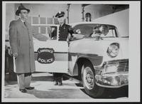 LPD new white car - Chief John Hazelet; and Traffic Sergeant Jack Evans.