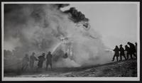 Fires - Probably fire fighting class of Kansas Schools on controlled fire.