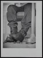 Craig McCoy&#39;s muddy boots.