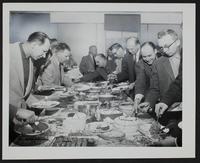March of Dimes - Lion&#39;s Club - dinner furnished by members who paid for dinner. Dr. Ted Kennedy (3rd from Left) Emory Scott (at rear, reaching); Dale Sillix (to his left) Raymond Andy Anderson, to his left; other unidentified.