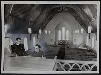 Lawrence Churches - Episcopal - readying for first service since fire (L to R) Frank Green, music director; Robert Swift, pastor; C. J. Tilton, tuning the organ for the Reuter Organ Company.
