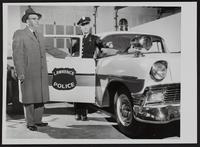 LPD new white car - Chief John Hazelet; and Traffic Sergeant Jack Evans.