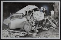 Auto wrecks - two killed at Pleasant Grove - Wyona May Hurst and Elmer G. Boyd. Sheriff&#39;s deputy Rex Johnson and Clarence Buller at car.