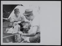 Highway Patrol - Checking safety equipment - Marvin Lafollette (left) and Howard Docker.