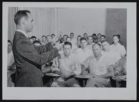 Highway Patrol - Lt. Clyde Bevis, lab technician of Wichita Police dept. instructs in class for rookies.