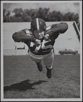 KU Football - Washington state players. A. Cougar Mascot Butch IV. B. Vaughn Hitchcock. C. Tom Gunnari. D. Bob Iverson. E. Gerald Brockey. F. Jim Hagerty.