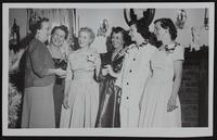Lawrence Socials - Holiday Tea (L to R) Mrs. Corlett (Nell) Cotton; Mrs. A. B. Ewing; Mrs. Hugh A. Randall, Wichita; Mrs. Robert Frakes; Mrs. Roger L. Ewing of Kc; Mrs. Raymond E. Crews, Jr