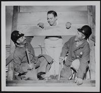 Centennial - No Shaving Permit - Don Hansinger in Stocks, C.E. Kerns (left) and Clayton Stone.