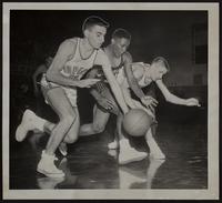 LHS Basketball v. Topeka (L to R) Pete Sumey; LHS's Carleton Hamm; Larry Mather, Topeka.