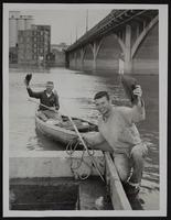 Kansas State canoeists - Ron Webb (left) and Franklin Houser complete trip on Kaw from Manhattan.