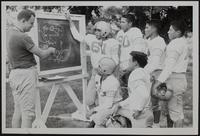 Haskell Football - Coach Tony Coffin and (standing L to R) Al Nephew; Wayne Postoak; Tom Johnson; Wayne Jimboy; (kneeling) - Stephen Albert; Franklin Wesho.