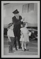 Pete Hermes and Penny Hermes meet with Union Pacific conductor Glenn Culver.