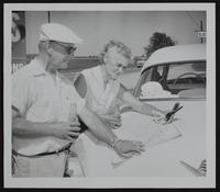 Summertime safety - Mr. and Mrs. L. F. Gable rest from driving.