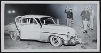 Auto Wrecks - East of Tonganoxie - Highway 24-40; Oral Earl Carter, Topeka, driver; Claude Williams, passenger; (L to R) Henry Campbell; Boob Woodson; Don Brauer, all Leavenworth deputies.