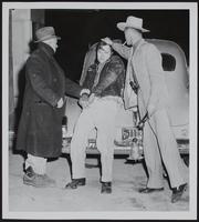 Crime - Tonganoxie - Burglary (probably) (L to R) Tonganoxie Town Marshall Fred Del Bonte; Jack Murray, suspect; unidentified