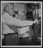 Dial phones - Lecompton - Mayor George F. Bahnmaier uses phone and Owen Smith, manager of Lawrence Office looks on.