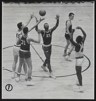 LHS Basketball - 1 - Gordon Abernathy (45) Ottawa's Fred Harder (31) and Marvin Wilson (25); Junior Smith (41) 2 - Abernathy and Wilson Fight for Ball. 3 - Abernathy Recovers ball. 34 unidentified 4 - Abernathy shoots.