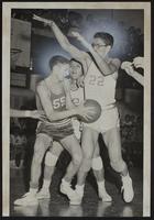 Haskell Basketball vs. Holton (L to R) Lyle Johnson (55) (Holton); Richard Powell (center); Elliott Ryall (22).
