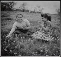 Wildflowers - Lora Lee Wiggins (left) and Linda Sue Thome picking flowers near Lone Star.