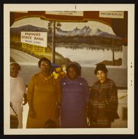 Unidentified women (4) at Farmers State Bank, Bogue, KS