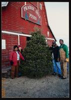 Angela Bates, Sherda, Tommy, and Gil with 2005 Christmas tree