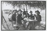 A, 2 Soldiers Eating in Outdoor Mess Hall, Fort Riley