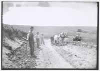 Good Roads - Men with Horse Teams Working on Roadbed