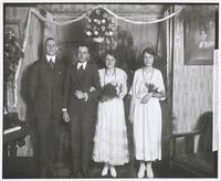 Garrett Wedding Group Standing in Decorated Room