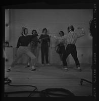 Two athletes fencing