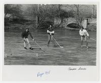 Three Students Playing Hockey on Potter Lake