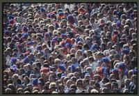 Football fans with blue and red pompoms