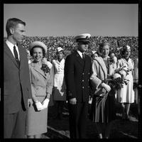 Homecoming Queen candidate with military escort