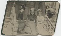 Group sitting on house steps