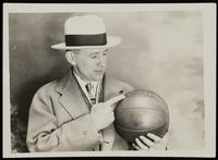 Phog Allen holding a basketball