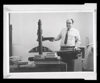 Joseph Rubinstein, Special Collections Director, Using a Book Press in the Department