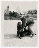 Two Students Ice Skating on Potter Lake