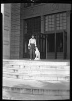 Student with eagle statue