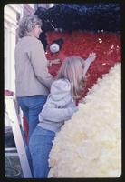 Students working on Homecoming display