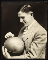 Phog Allen holding a basketball