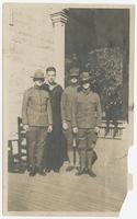 Four Beta members, in Army and Navy uniforms